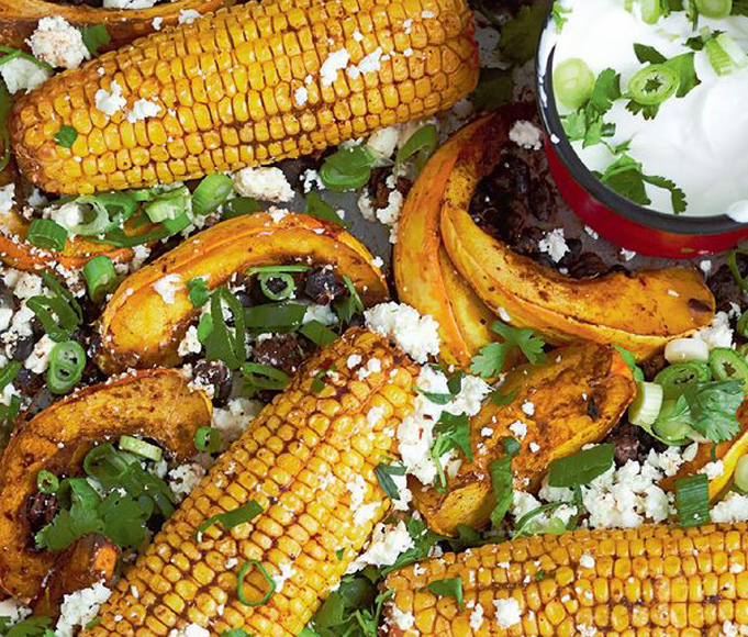 Chipotle-roasted sweetcorn with squash, black beans, feta & lime